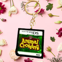 Load image into Gallery viewer, I owe a raccoon a lot of money keychain